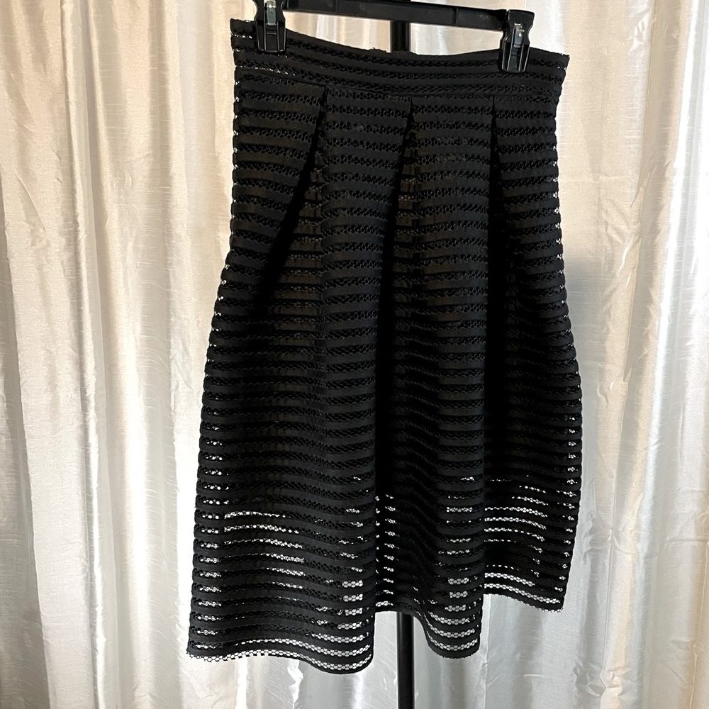 Chic Wish size Medium black midi length ribbon and knit skirt.
